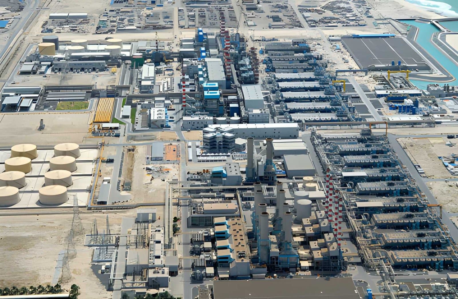 Aerial view of a major UAE energy industrial complex — ADNOC expansion projects and oil and gas infrastructure