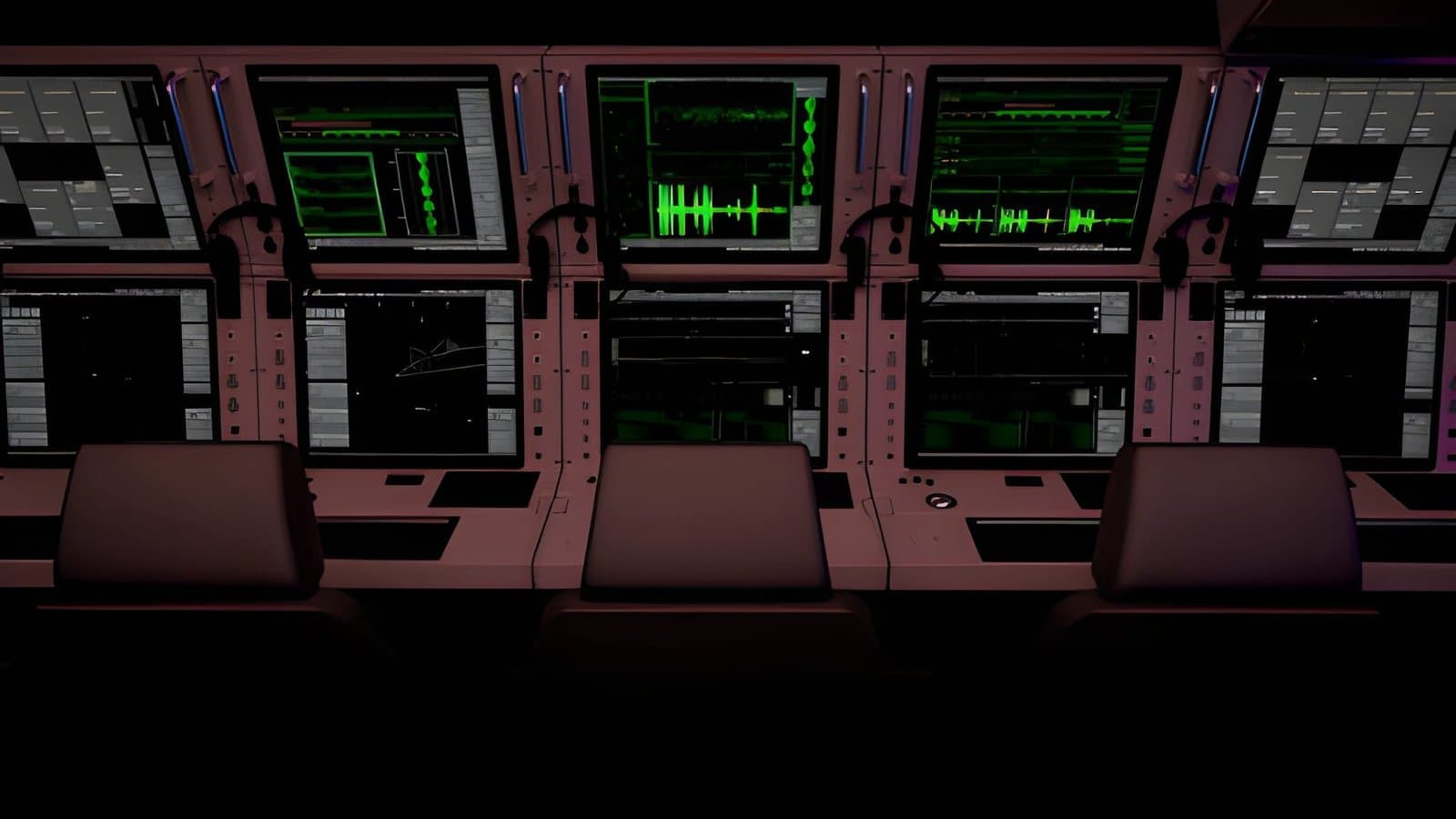 Data centre or critical facility control room with multi-monitor consoles for power, cooling and systems monitoring